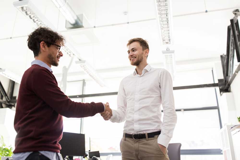 Colleagues shaking hands